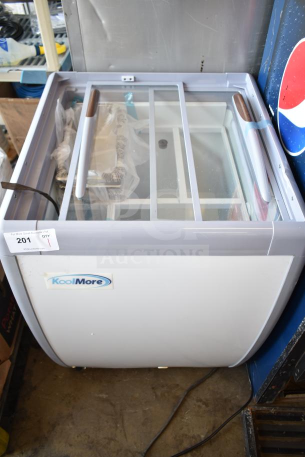 KoolMore KM-GDC-26SD 5-pan gelato display freezer, new with minor scratches, sliding glass doors, on casters, 6 cu. ft. capacity.