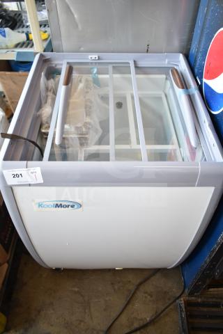 KoolMore KM-GDC-26SD 5-pan gelato display freezer, new with minor scratches, sliding glass doors, on casters, 6 cu. ft. capacity.