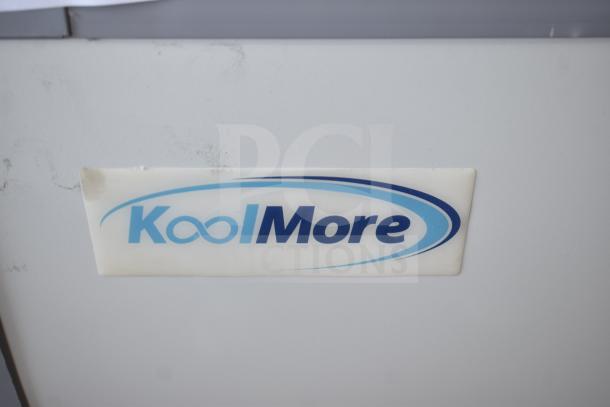KoolMore KM-GDC-26SD label on a new scratch and dent 26-inch gelato display freezer with sliding glass door.