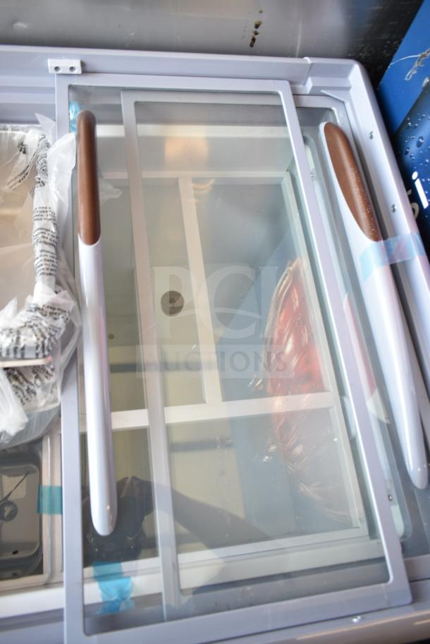 KoolMore KM-GDC-26SD Gelato Dipping Cabinet, 26 in., 5-pan, sliding glass doors, new condition, on commercial casters.