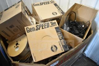 Pallet lot of GenSpeed Cat 5e Riser Cables, includes several boxes, some opened; marked "GenSPEED 5e Series."