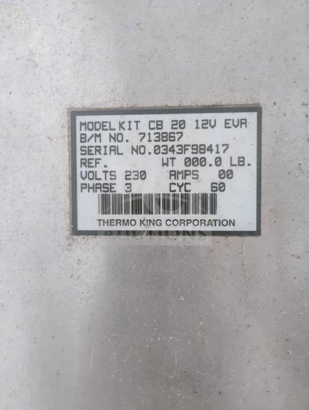 Thermo King Corporation label for rooftop reefer unit, Model Kit CB 20 12V EVA. Shows serial number, voltage, and phase.