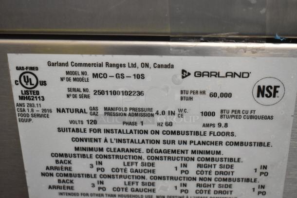 Garland MCO-GS-10S convection oven label showing model, serial number, natural gas, 60,000 BTU, and certification marks.