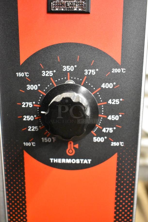 Thermostat control panel of a Vulcan convection oven, showing temperature settings from 100°F to 500°F and 50°C to 250°C.
