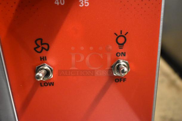 Toggle switches for fan speed ("HI/LOW") and light ("ON/OFF") on a Vulcan convection oven control panel.