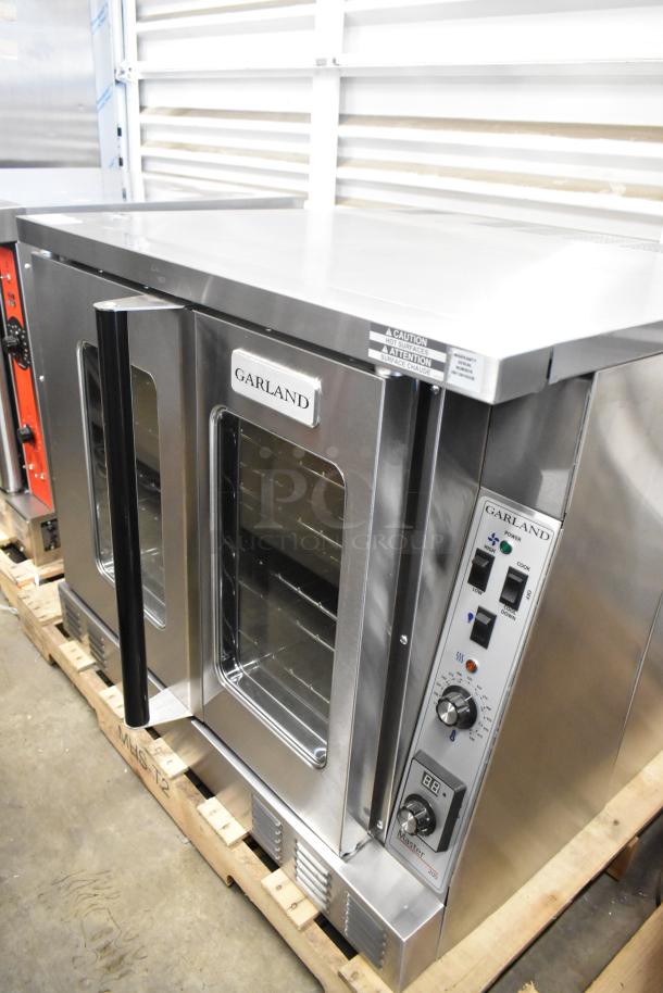 Brand new 2025 Garland MCO-GS-10S stainless steel convection oven, natural gas, 60,000 BTU, view-through doors, metal racks.