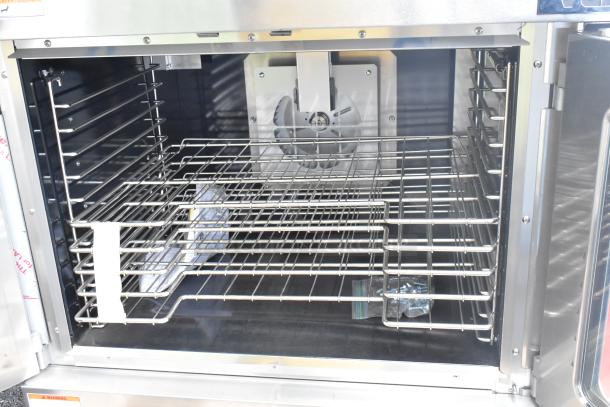 BRAND NEW Vulcan VC5GD-11D1Z convection oven, stainless steel, gas powered, view-through doors, metal racks, thermostatic controls.