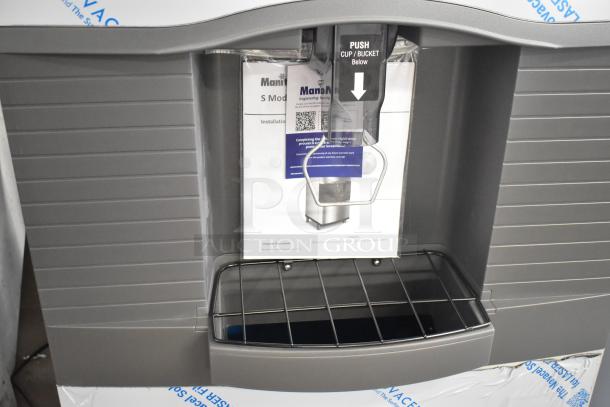BRAND NEW 2025 Manitowoc SPA312-161 Stainless Steel 30" Touchless Ice Dispenser, 180 lb. capacity, 115V, with visible manual.