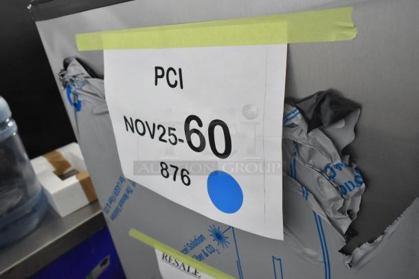 Manitowoc SPA312-161 stainless steel touchless hotel ice dispenser, 180 lb capacity, 115V, minor scratches visible.