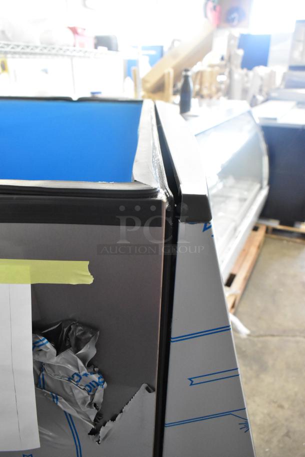 Brand new 2025 Manitowoc SPA312-161 stainless steel touchless ice dispenser, 180 lb. capacity, 115V, with visible scratch and dent.