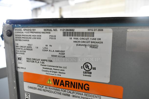 Brand new 2025 Manitowoc SPA312-161 stainless steel 30" touchless hotel ice dispenser, 180 lb., 115V, 1 phase, with warning label.