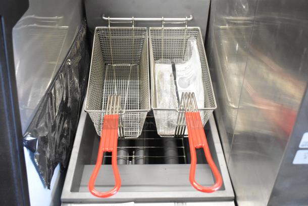 Mainstreet 541FF40L stainless steel propane fryer, 40 lb. capacity, with two metal baskets and red handles, 90,000 BTU, new.