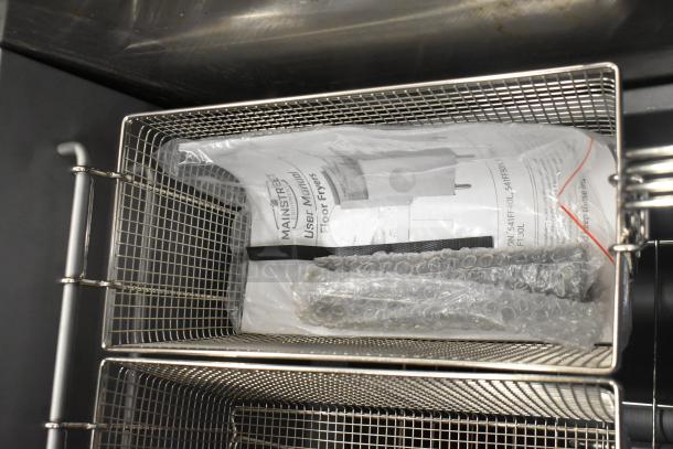 BRAND NEW Mainstreet 541FF40L stainless steel 40 lb. deep fryer, propane gas, with 2 metal baskets. User manual included.
