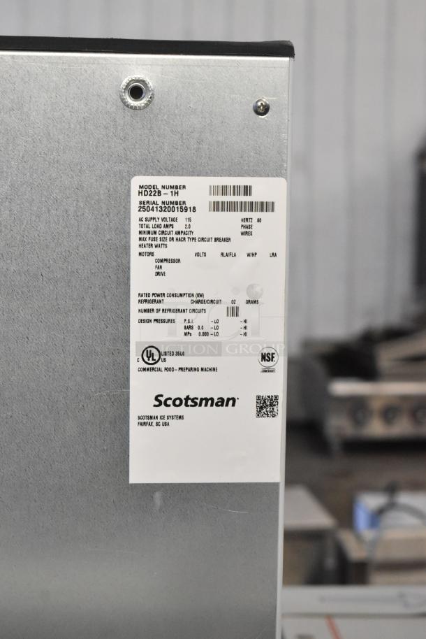 BRAND NEW 2025 Scotsman HD22B-1H Stainless Steel Ice Dispenser, 120 lb. Capacity, 115V, 1 Phase. Model label visible.