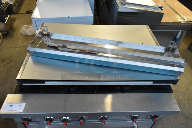 Cooking Performance Group 351S36L stainless steel 6-burner commercial range, liquid propane, new, scratch and dent, 210,000 BTU.