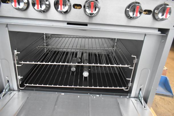 Brand new Cooking Performance Group 351S36L range, 6 burners, 36" stainless steel, liquid propane, 210,000 BTU, standard oven.