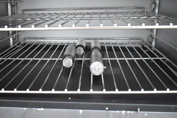 Stainless steel interior of a Cooking Performance Group S36-L 6 burner range oven, brand new with minor scratches, 36" wide.