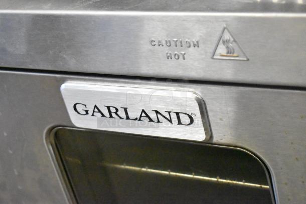 Garland Master 200 stainless steel convection oven with view through door and caution hot label.