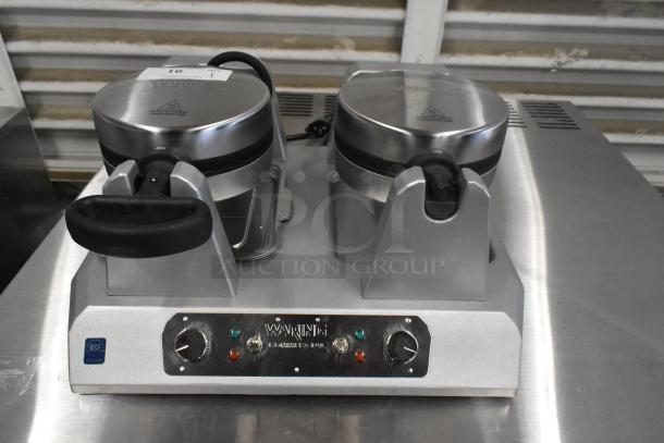 Brand new Waring WW250X2 double Belgian waffle maker, metal, non-stick, 120 volts, minor scratches and dents visible.