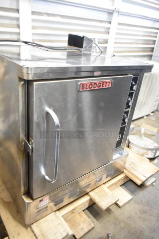Brand new Blodgett DFG-50 convection oven, stainless steel, 27,500 BTU, natural gas, solid door, metal racks, thermostatic controls.