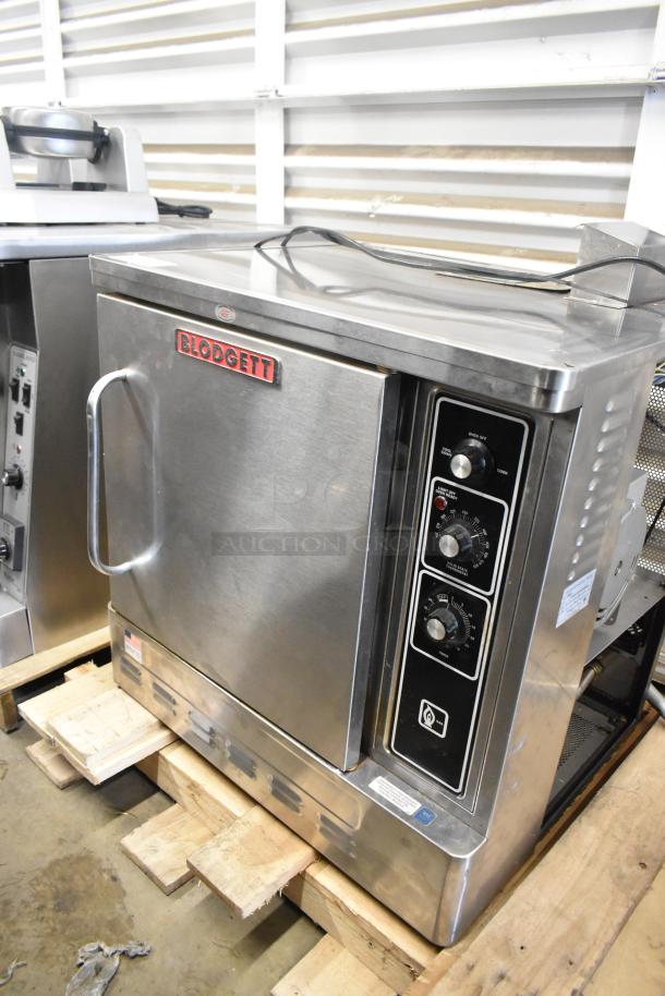 BRAND NEW Blodgett DFG-50 stainless steel convection oven, solid door, metal racks, thermostatic controls, 27,500 BTU.