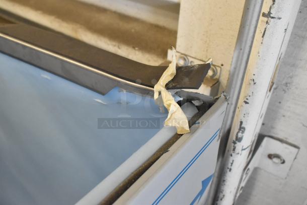 Brand new Hoshizaki B-900SF stainless steel ice storage bin, 900 lb capacity, 52" wide, visible scratch and dent on corner.