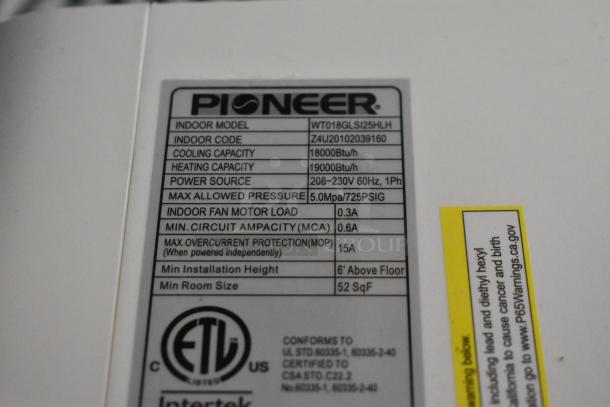 Brand new Pioneer WT018GLSI25HLH air curtain, 18,000 BTU, 208-230V, 1 phase, with label showing technical specifications.