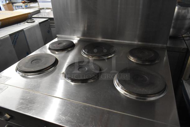 BRAND NEW SCRATCH AND DENT! Cooking Performance Group 36" 6-burner electric range, stainless steel, with oven, overshelf, 240V, 1 phase.