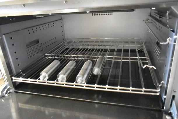 BRAND NEW Cooking Performance Group 36" 6-Burner Electric Range, stainless steel, scratch and dent, oven interior view.