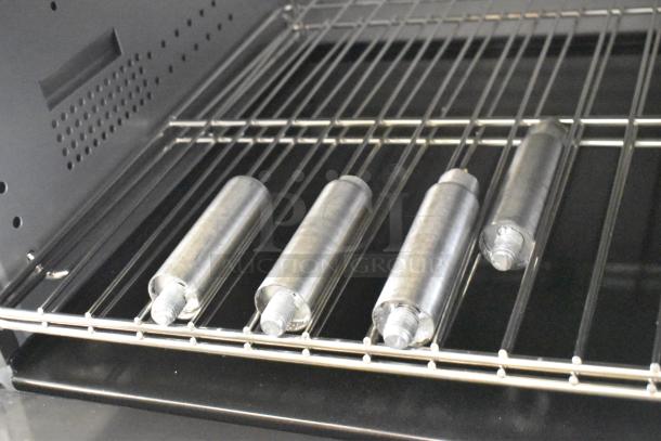 BRAND NEW Cooking Performance Group 36" stainless steel electric range interior, featuring oven rack details.