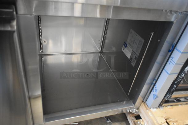 Brand new 2025 Avantco 178SSUD3R stainless steel 3-door undercounter cooler, right door needs reattachment, 115V, 1-phase.