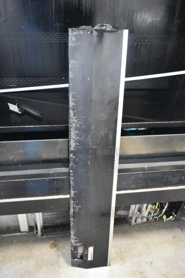 Turbo Air TOM-50B-SP-A-N metal reach-in merchandiser in used condition; 115 volts, one phase. Visible wear on the surface.