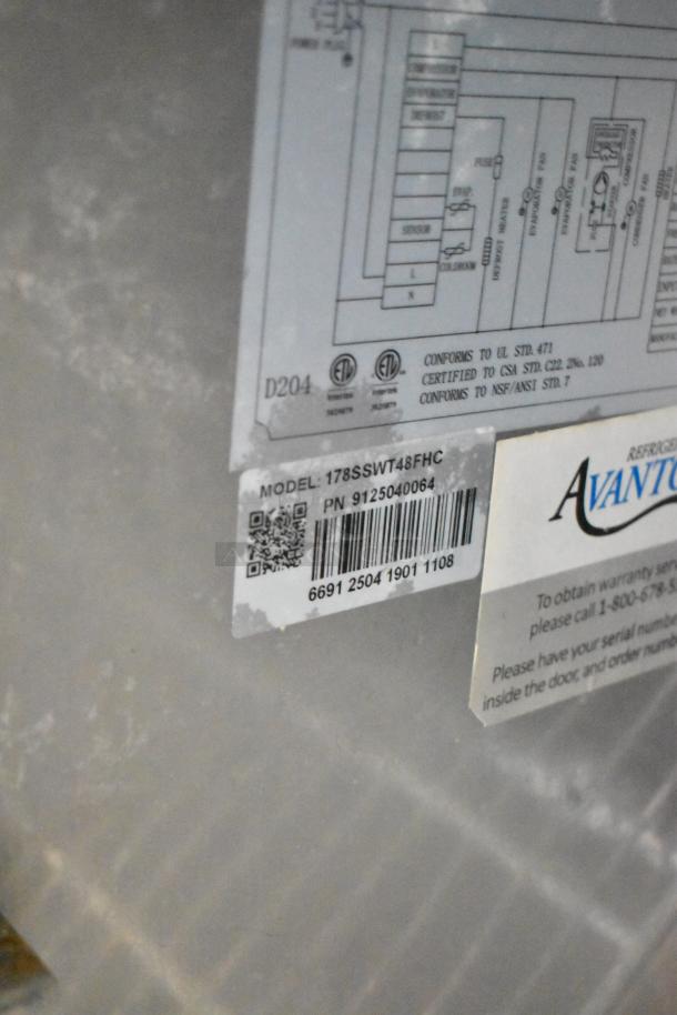 Avantco 178SSWT48FHC stainless steel undercounter cooler, 2 doors, on casters. Model and certification details visible.