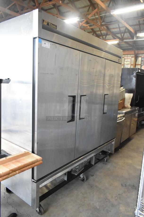 True T-72F stainless steel 3-door commercial reach-in freezer on casters, with poly-coated racks, 115V, 1 Phase.