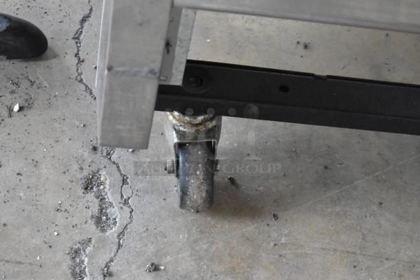 True T-72F stainless steel reach-in freezer on commercial casters. Features poly coated racks, 115V, 1 phase.