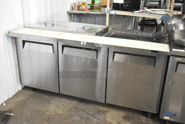 Turbo Air MST-72-30-N stainless steel sandwich salad prep table on casters, three-door, 115V, 1 phase, commercial use.