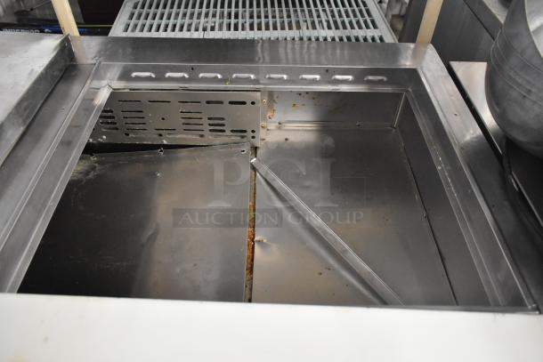 Turbo Air MST-72-30-N stainless steel commercial prep table interior, showing clean compartments and sturdy construction.