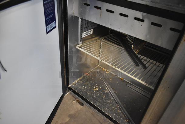 Turbo Air MST-72-30-N stainless steel sandwich prep table, commercial casters, visible interior shelving, 115 Volts, used condition.