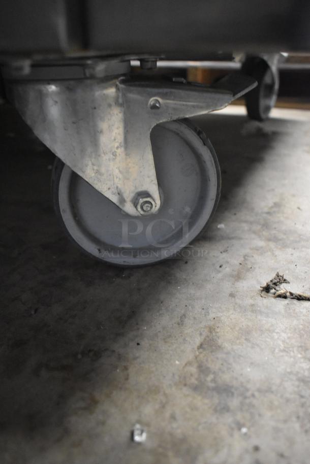 Close-up of a commercial caster wheel on a 2022 Desmon GBF-15+ETL Blast Chiller Shock Freezer.