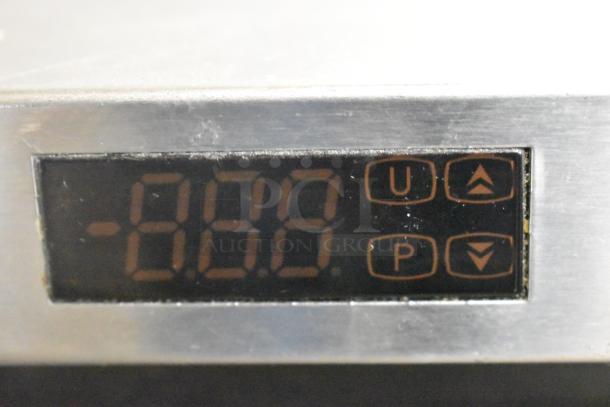 Close-up of the digital temperature display on a Turbo Air MUF-36-N undercounter freezer.