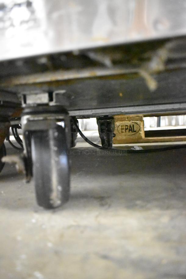 Turbo Air MUF-36-N stainless steel undercounter freezer on commercial casters, 115 volts, 1 phase, shown from the underside.