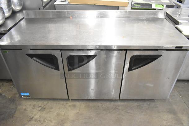Turbo Air TWR-72SD-N stainless steel 3-door work top cooler on casters. 115 volts, 1 phase. Slight wear visible.