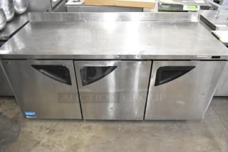 Turbo Air TWR-72SD-N stainless steel 3-door work top cooler on casters. 115 volts, 1 phase. Slight wear visible.