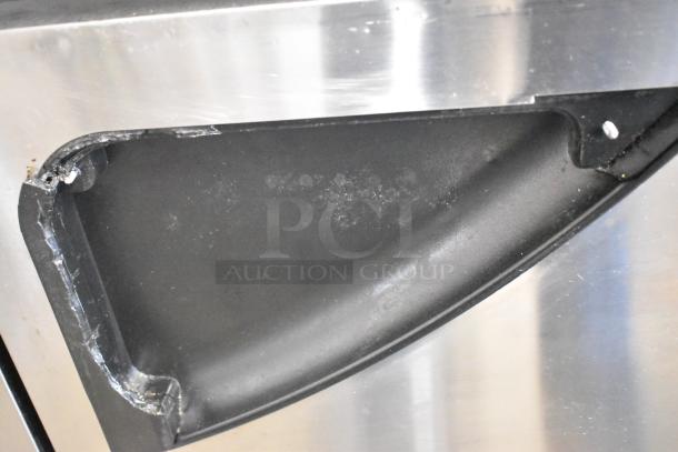 Turbo Air TWR-72SD-N stainless steel work top cooler detail showing black plastic interior corner and metal surface.
