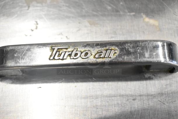Turbo Air TWR-72SD-N stainless steel handle, featuring branded engraving, on commercial casters. Model MST-72-30-N.