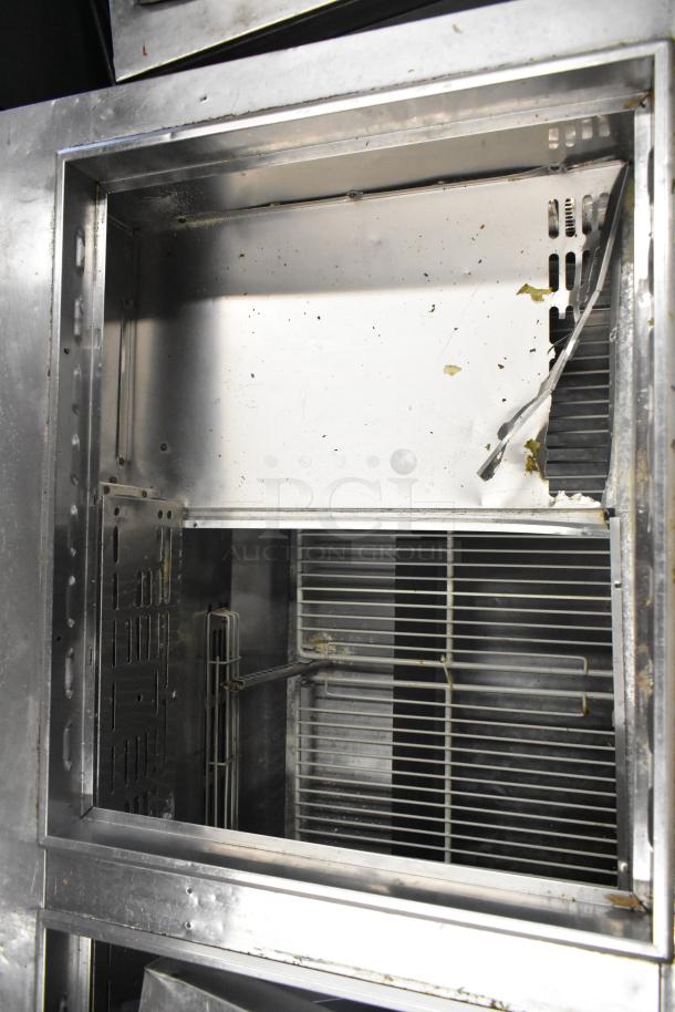 Turbo Air MST-72-30-N stainless steel prep table, interior view, commercial casters, visible wear, 115V, 1 phase.