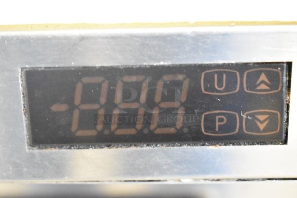 Close-up of Turbo Air TWR-72SD-N control panel with digital display and buttons.