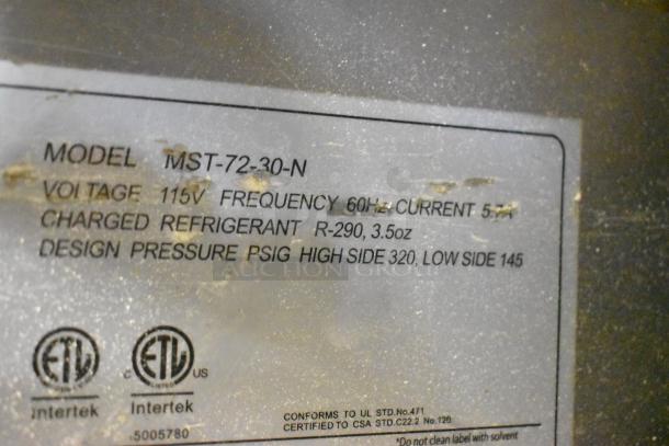Turbo Air MST-72-30-N stainless steel prep table label showing model, voltage, refrigerant, and pressure specifications.