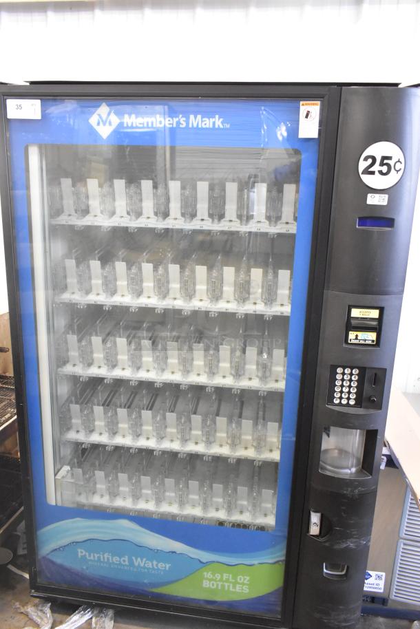 Crane 5800-4 metal vending machine for bottled drinks, features a bill acceptor, 25-cent cost, 115 volts, 1 phase, good condition.
