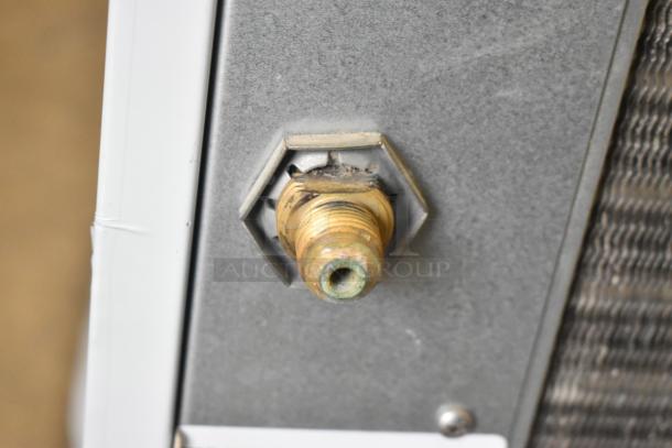 Close-up of connector on a 2017 Scotsman F1222A-32D stainless steel commercial ice machine, 208/230V, 1 phase.